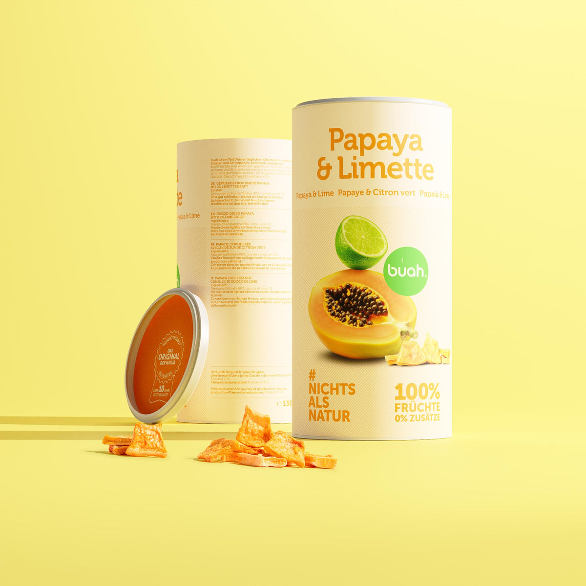 Quadratische Produktdarstellung einer buah-Dose „Papaya & Limette“ mit gefriergetrockneter Papaya auf hellgelbem Hintergrund; „100 % Früchte, 0 % Zusätze“.